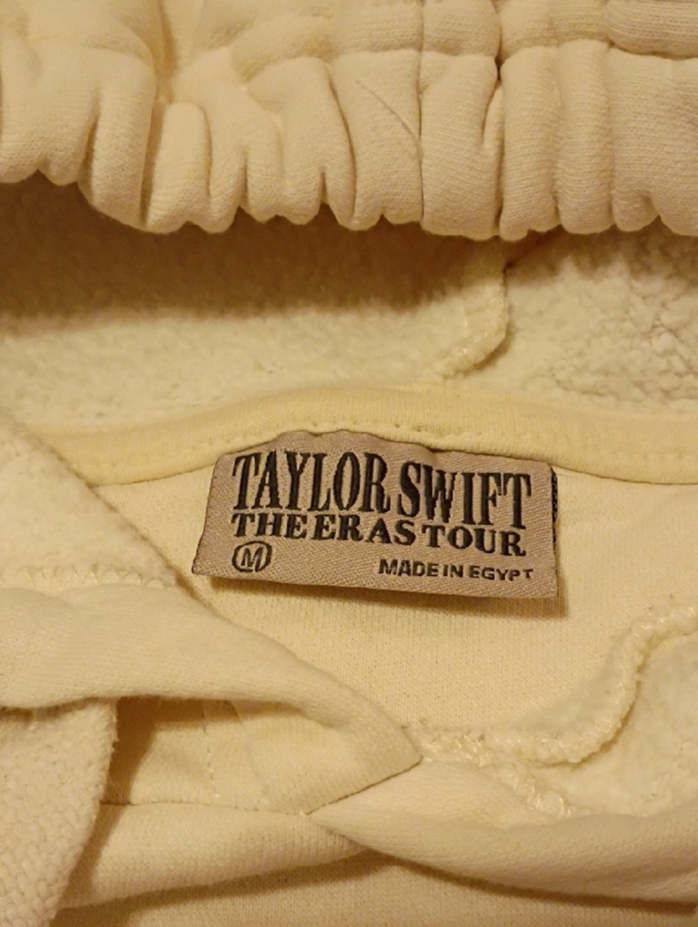 Taylor Swift Cream Pullover Hoodie with Black Text - Picture 3 of 6